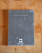 Scratched notebook on a wooden surface