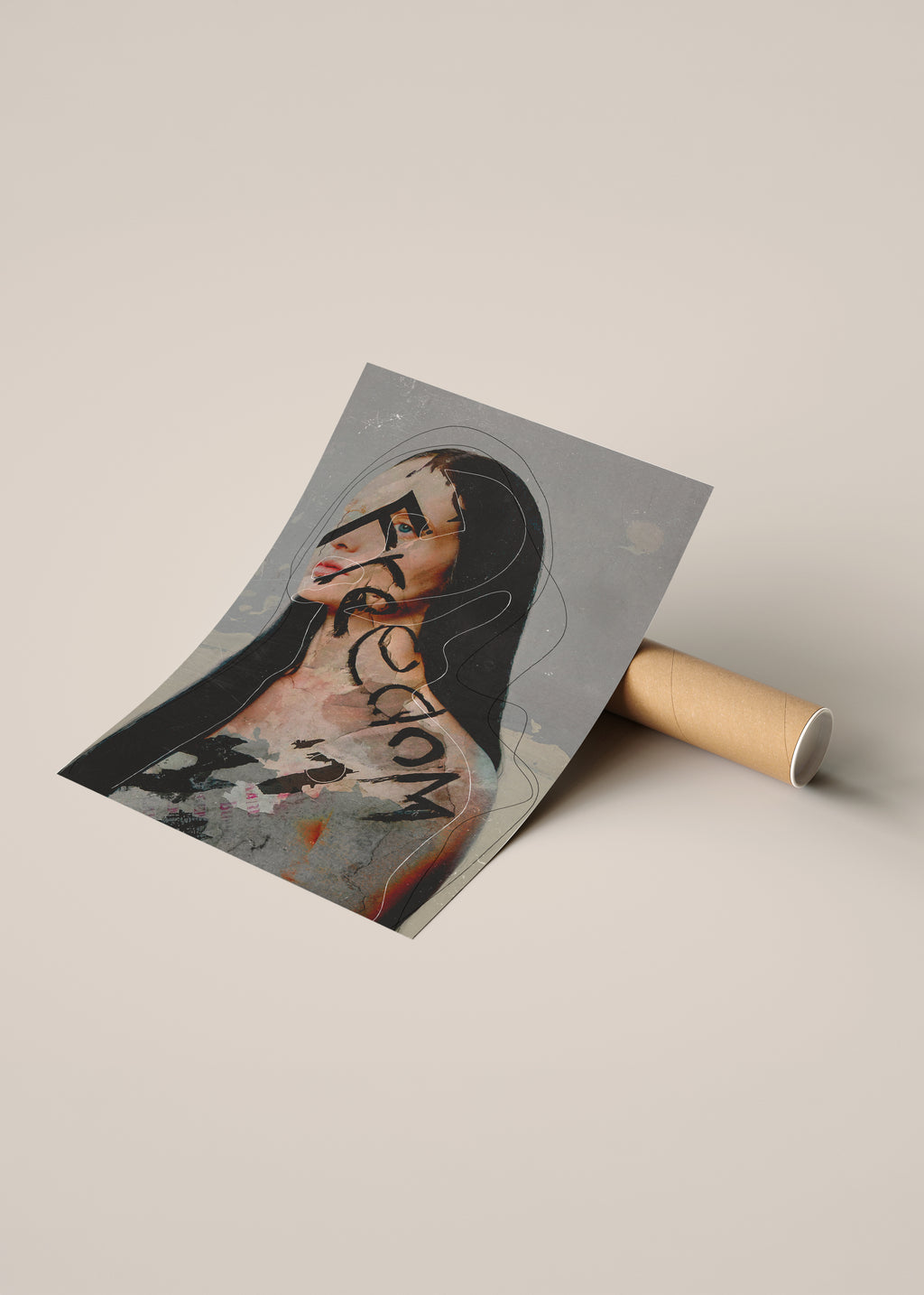 A rolled sheet of printed art or poster paper lies on a cardboard tube, partially unrolled to show an abstract portrait illustration with the word 'Freedom' written across it.