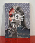 A square canvas art print featuring a surreal collage portrait of a woman with red, white, and black elements, set against a gray background with white wavy lines. The print is displayed standing on a red reflective surface against a white wall.